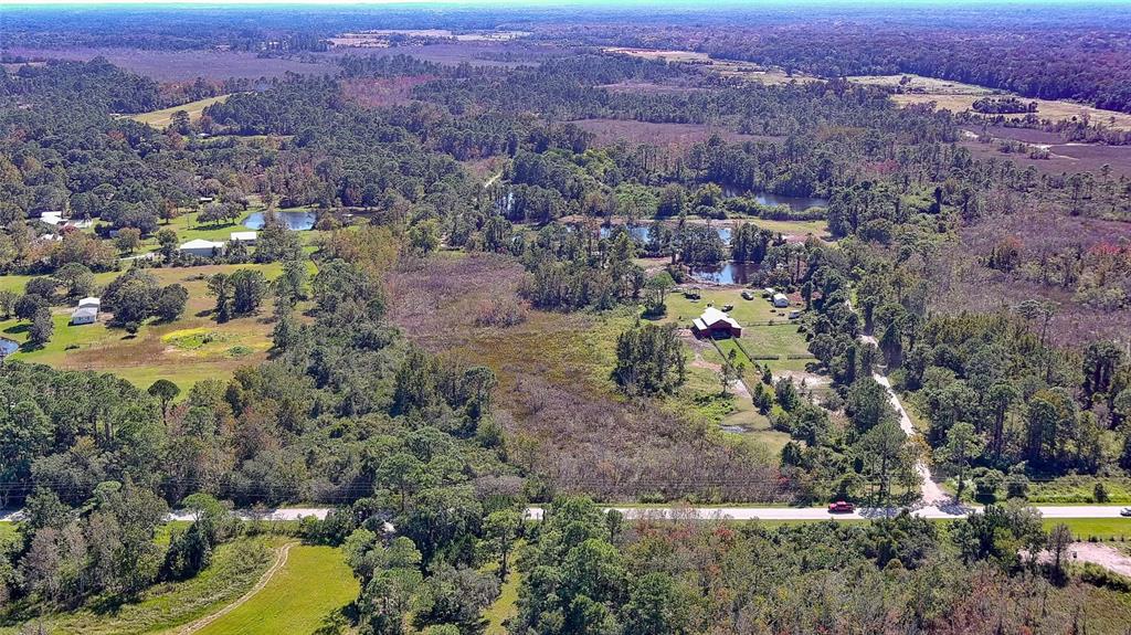 806 West Ariel Road Edgewater, FL 32141 - Photo 4 of 12 an aerial view of multiple house