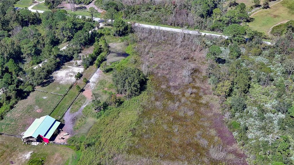 806 West Ariel Road Edgewater, FL 32141 - Photo 5 of 12 an aerial view of house with outdoor space