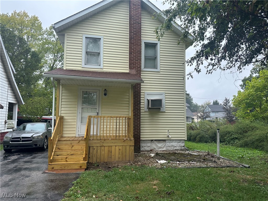 835 Inman Street Akron, OH 44306 - Photo 25 of 25 View of back facade with covered porch and a front yard
