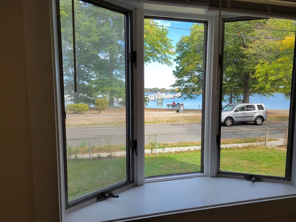 31 Avalon Avenue, Unit 1 Quincy, MA 02169 - Photo 10 of 10 a view of a room and floor to ceiling window next to a yard