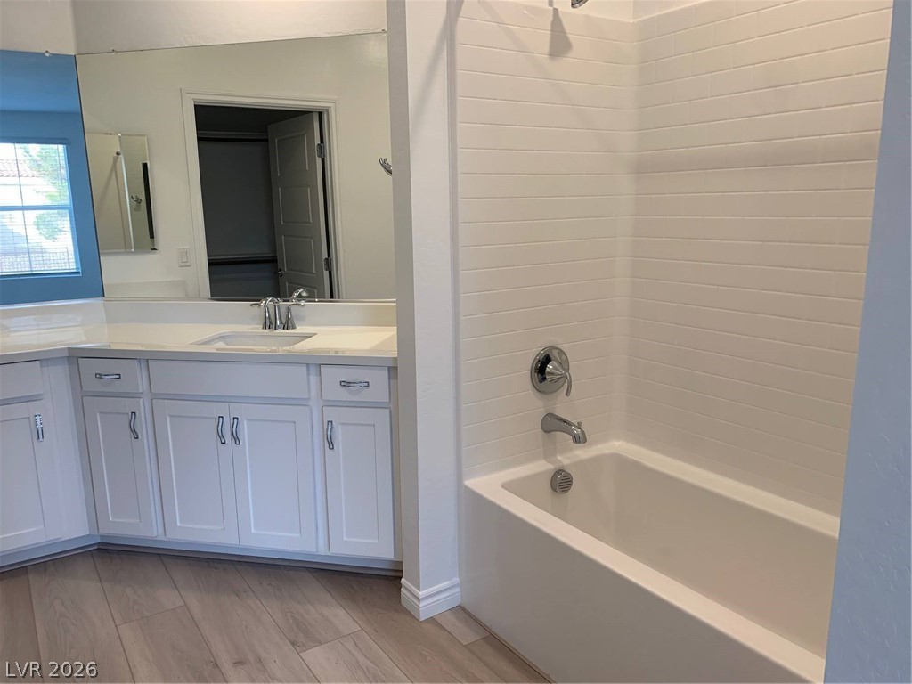2555 Hampton Road, Unit 7109 Henderson, NV 89052 - Photo 26 of 34 Elegant white cabinetry provides ample storage in this well-appointed bathroom.