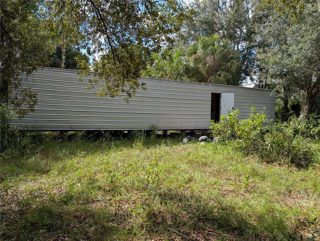 109 Rhododendron Lane Interlachen, FL 32148 - Photo 2 of 7 a view of outdoor space and yard