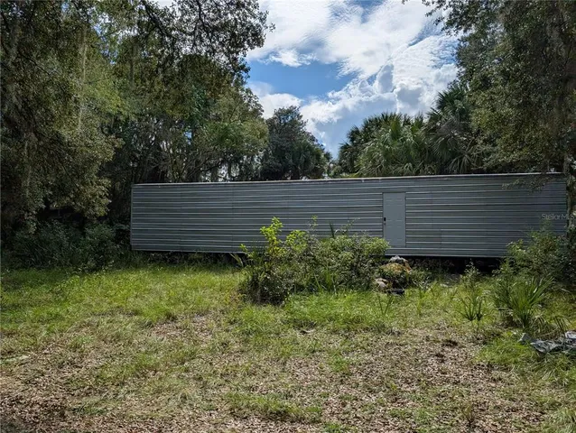 a view of outdoor space and yard