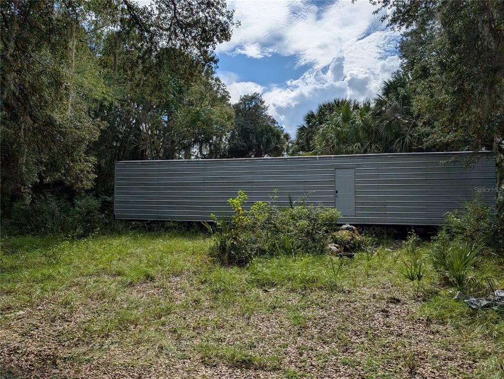 109 Rhododendron Lane Interlachen, FL 32148 - Photo 4 of 7 a view of outdoor space and yard
