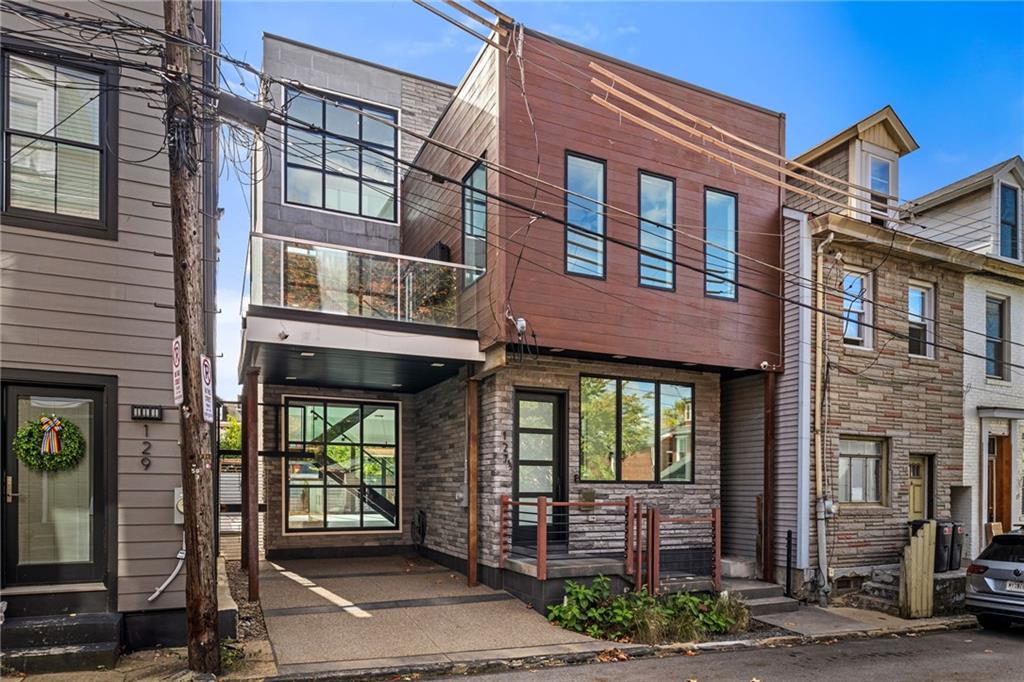 a front view of a brick building with a entrance
