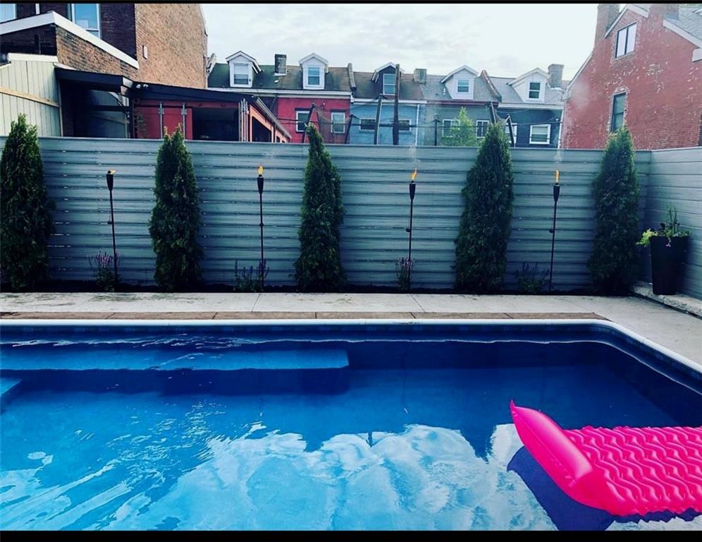 127 1/2 Banner Way Pittsburgh, PA 15201 - Photo 3 of 48 a view of swimming pool with a balcony