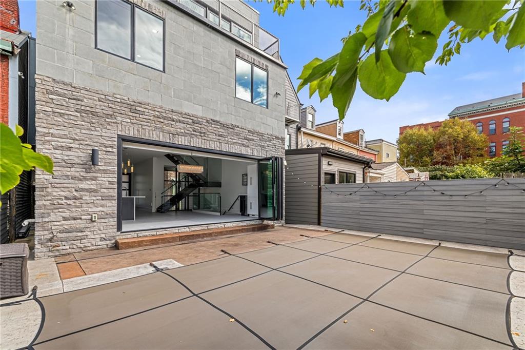 127 1/2 Banner Way Pittsburgh, PA 15201 - Photo 37 of 48 a view of a house with a window and a potted plant