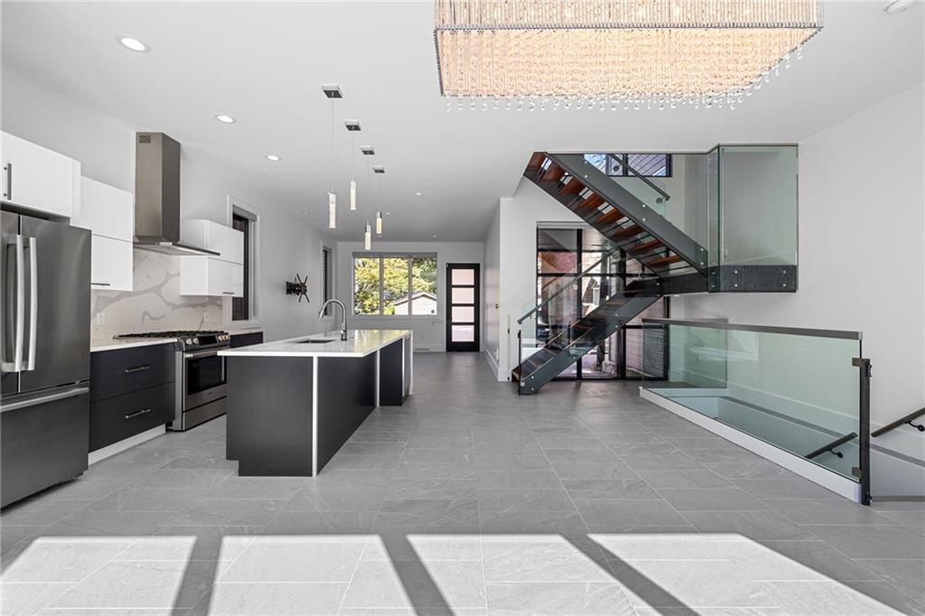 127 1/2 Banner Way Pittsburgh, PA 15201 - Photo 9 of 48 a living room with furniture and a wooden floor