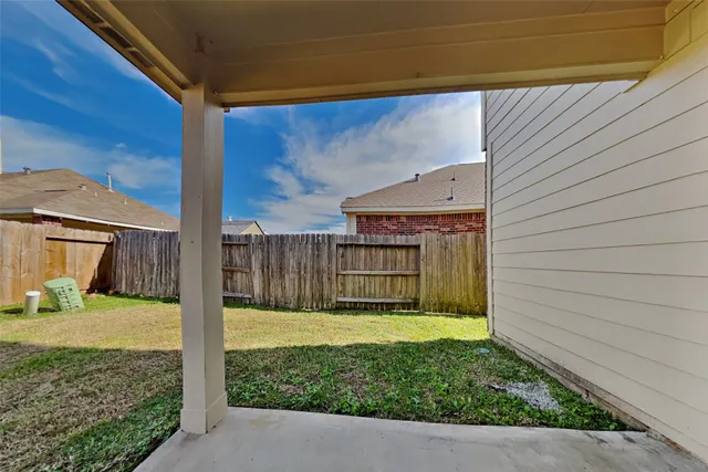 a view of a backyard with a garden