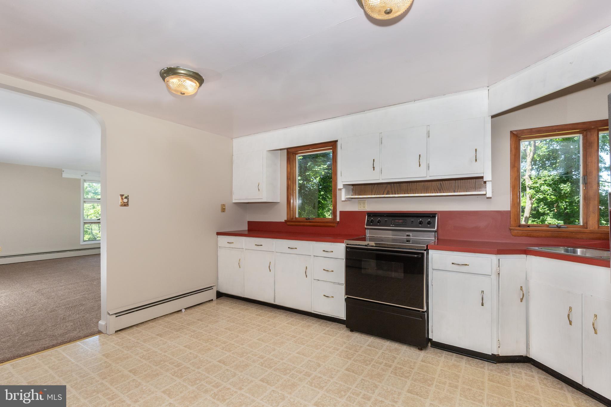 1023 Cherrytown Road Westminster, MD 21158 - Photo 13 of 39 Kitchen access to LR, DR, screened in porch