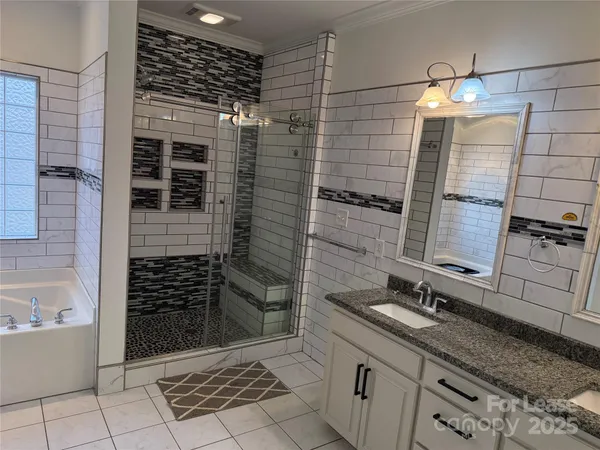 a bathroom with a shower and toilet