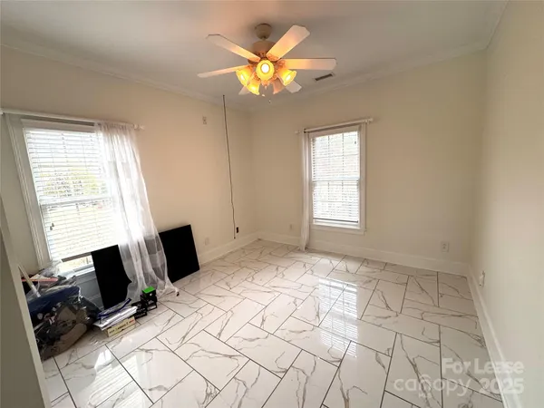 a kitchen with stainless steel appliances a refrigerator and a stove