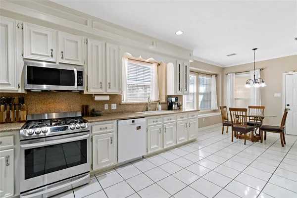 a view of a dining room with furniture