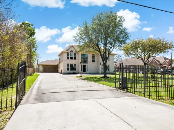 aerial view of a house with a garden