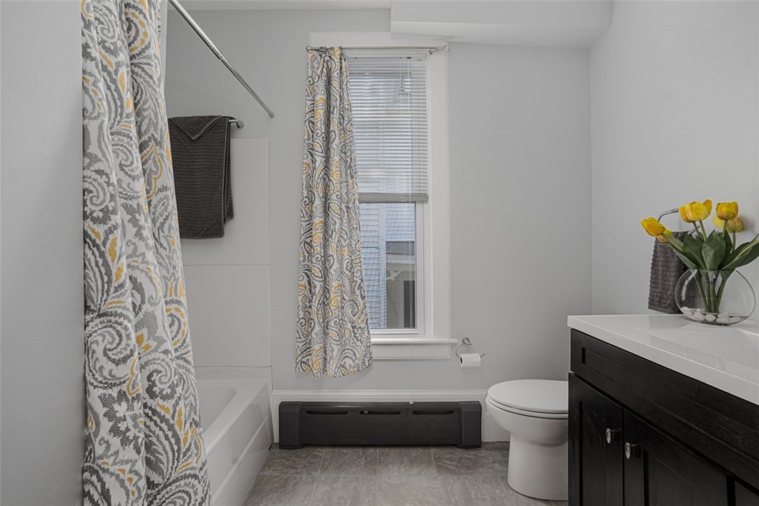 8 Everett Street, Unit 2 Newport, RI 02840 - Photo 20 of 29 Updated full bathroom with tub/shower and tile flooring