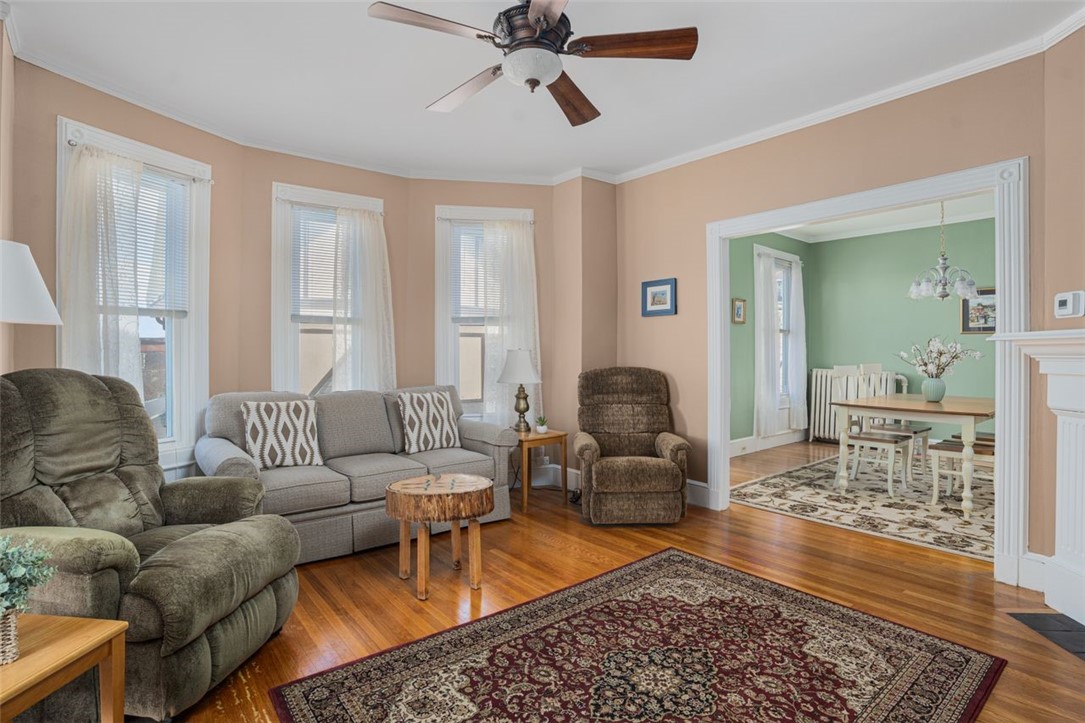 8 Everett Street, Unit 2 Newport, RI 02840 - Photo 6 of 29 Living room with large windows offering an abundance of light
