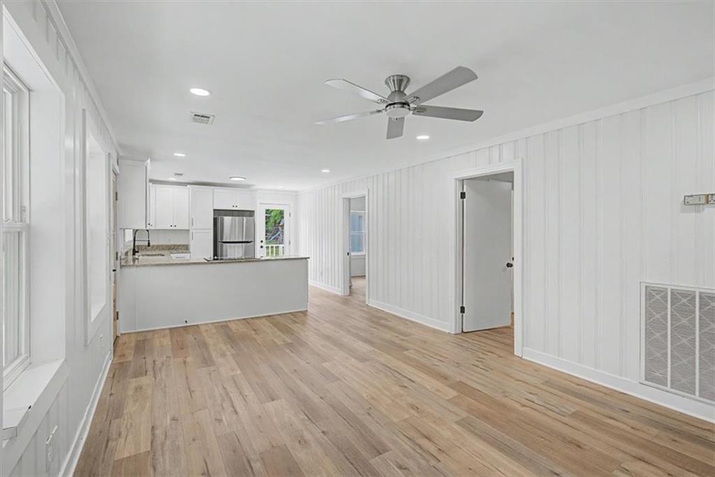 2115 King Road Dalton, GA 30720 - Photo 15 of 54 a view of a kitchen with wooden floor and a kitchen