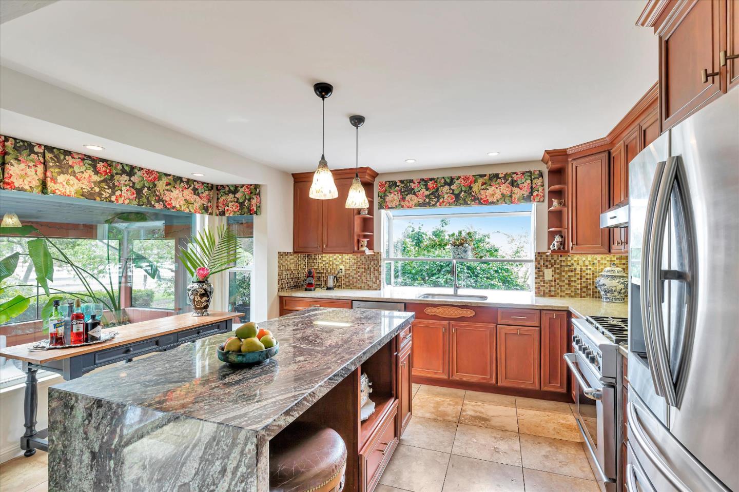 1660 Eberts Drive San Martin, CA 95046 - Photo 13 of 77 a kitchen with stainless steel appliances granite countertop sink stove and refrigerator