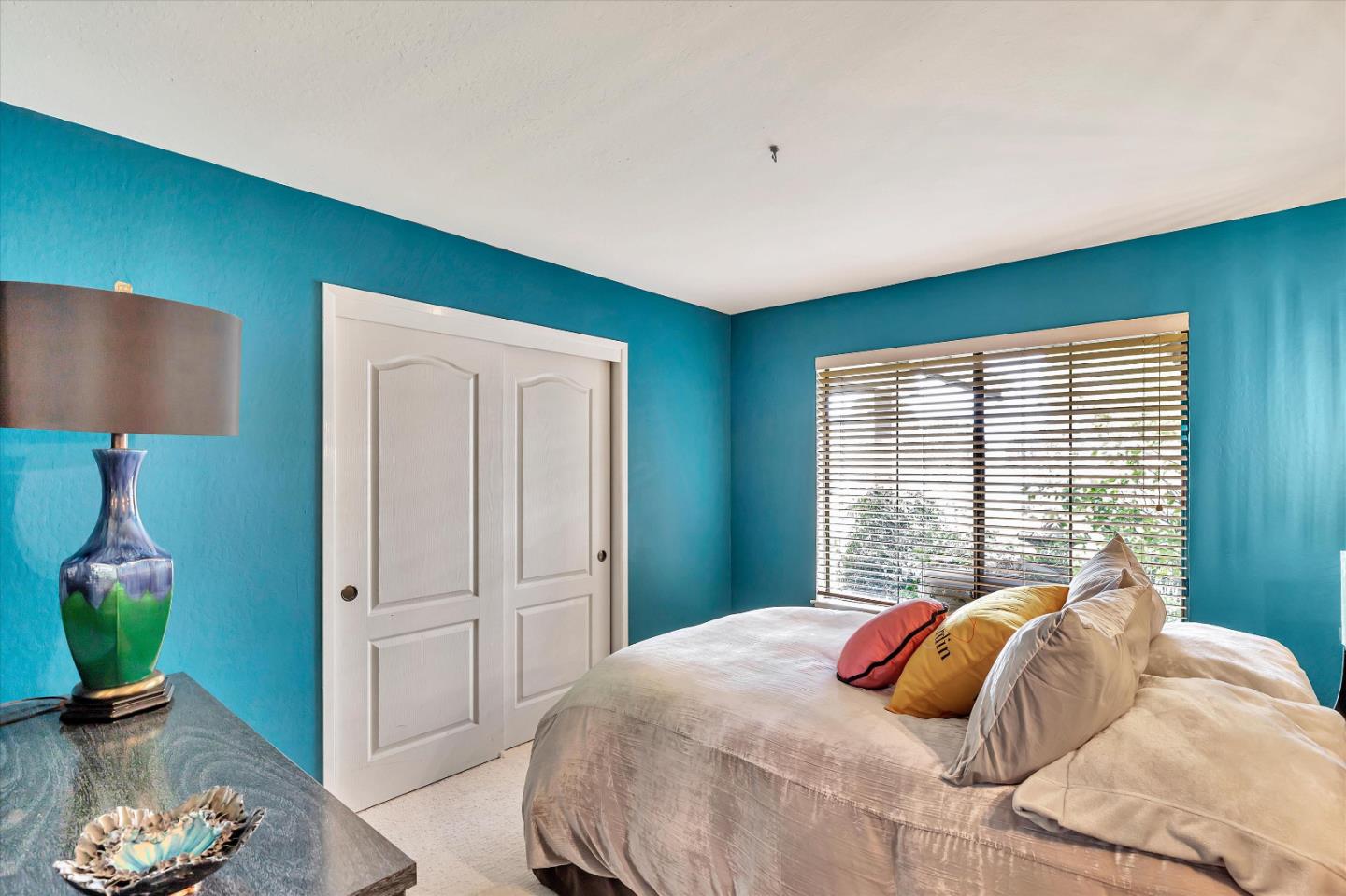 1660 Eberts Drive San Martin, CA 95046 - Photo 19 of 77 a bedroom with a bed and a window