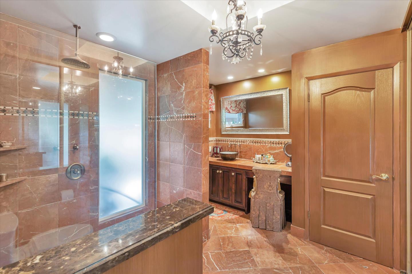 1660 Eberts Drive San Martin, CA 95046 - Photo 24 of 77 a kitchen with stainless steel appliances granite countertop a refrigerator and a stove