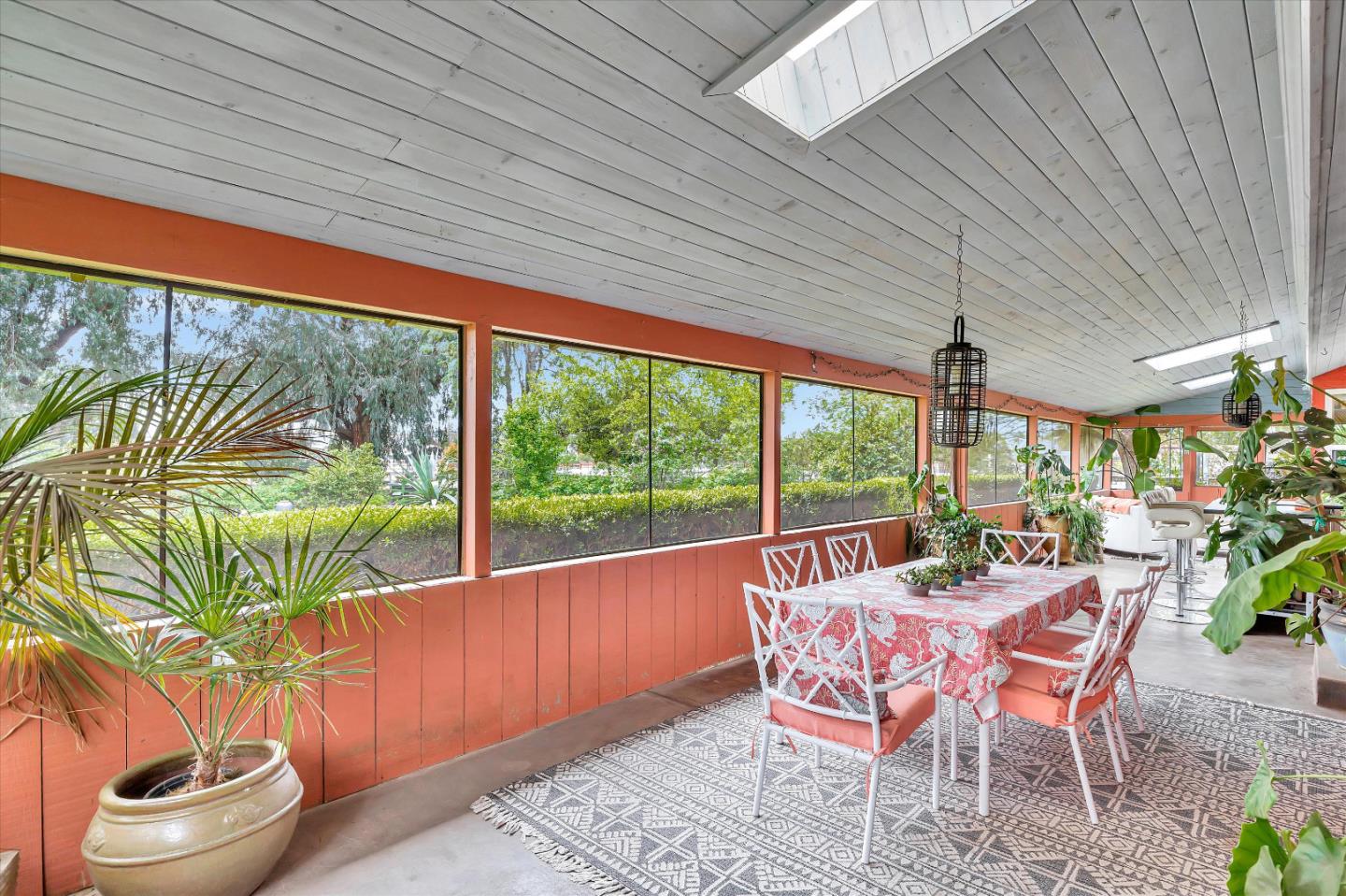 1660 Eberts Drive San Martin, CA 95046 - Photo 28 of 77 a dining room with furniture and a floor to ceiling window
