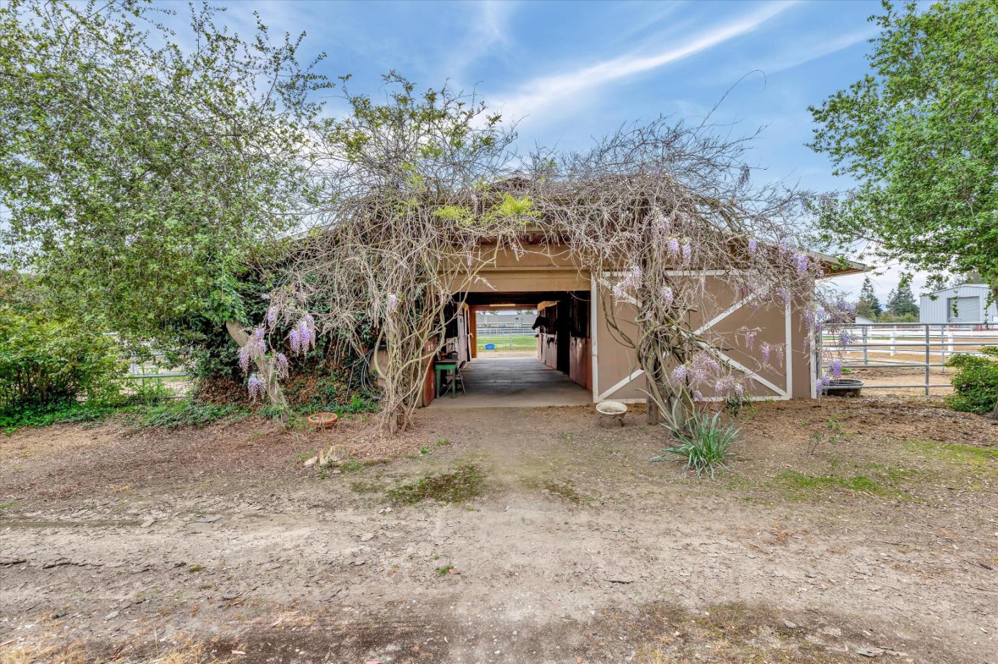 1660 Eberts Drive San Martin, CA 95046 - Photo 44 of 77 a view of a house with a yard and a tree