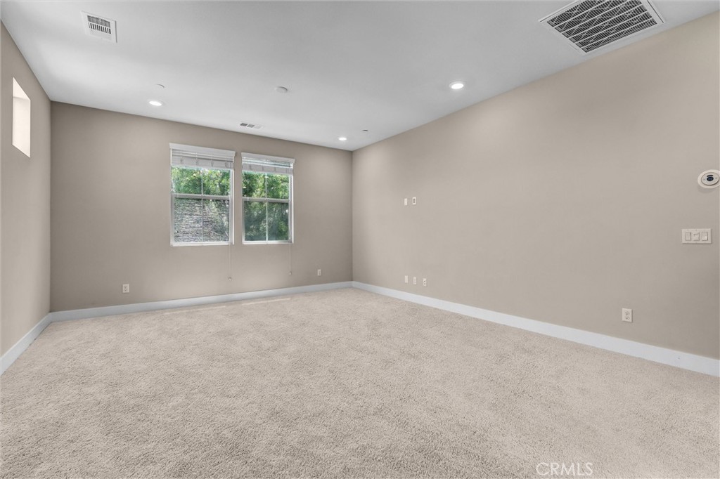 111 Drama Irvine, CA 92618 - Photo 13 of 28 an empty room with windows