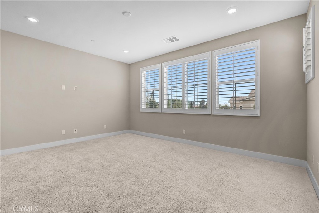 111 Drama Irvine, CA 92618 - Photo 16 of 28 a view of an empty room with a window