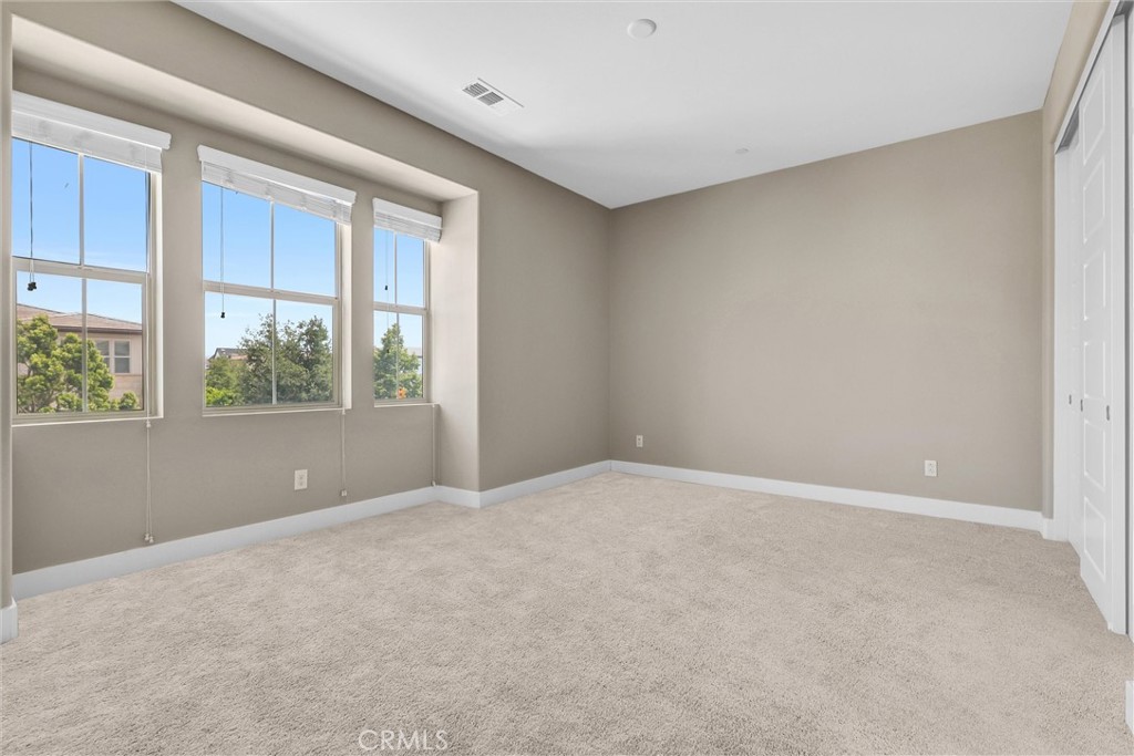 111 Drama Irvine, CA 92618 - Photo 22 of 28 an empty room with a window