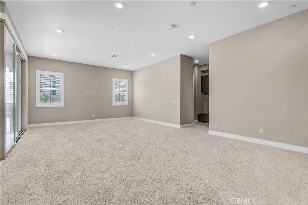 111 Drama Irvine, CA 92618 - Photo 6 of 28 a view of an empty room with a window