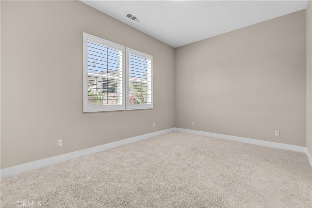 111 Drama Irvine, CA 92618 - Photo 10 of 28 an empty room with a window
