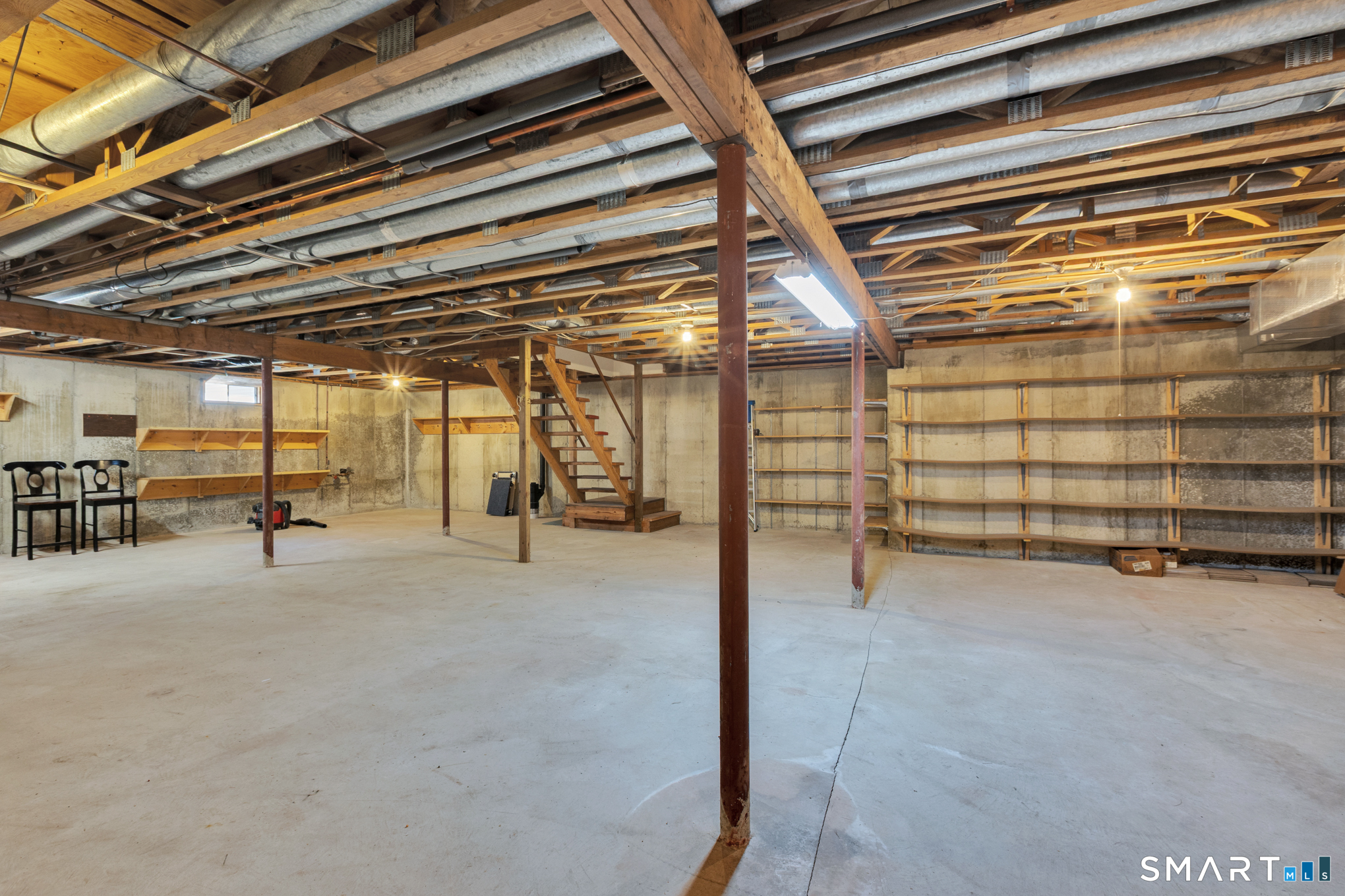 81 Oldefield Farms Road, Unit 81 Enfield, CT 06082 - Photo 27 of 35 a view of a room with storage