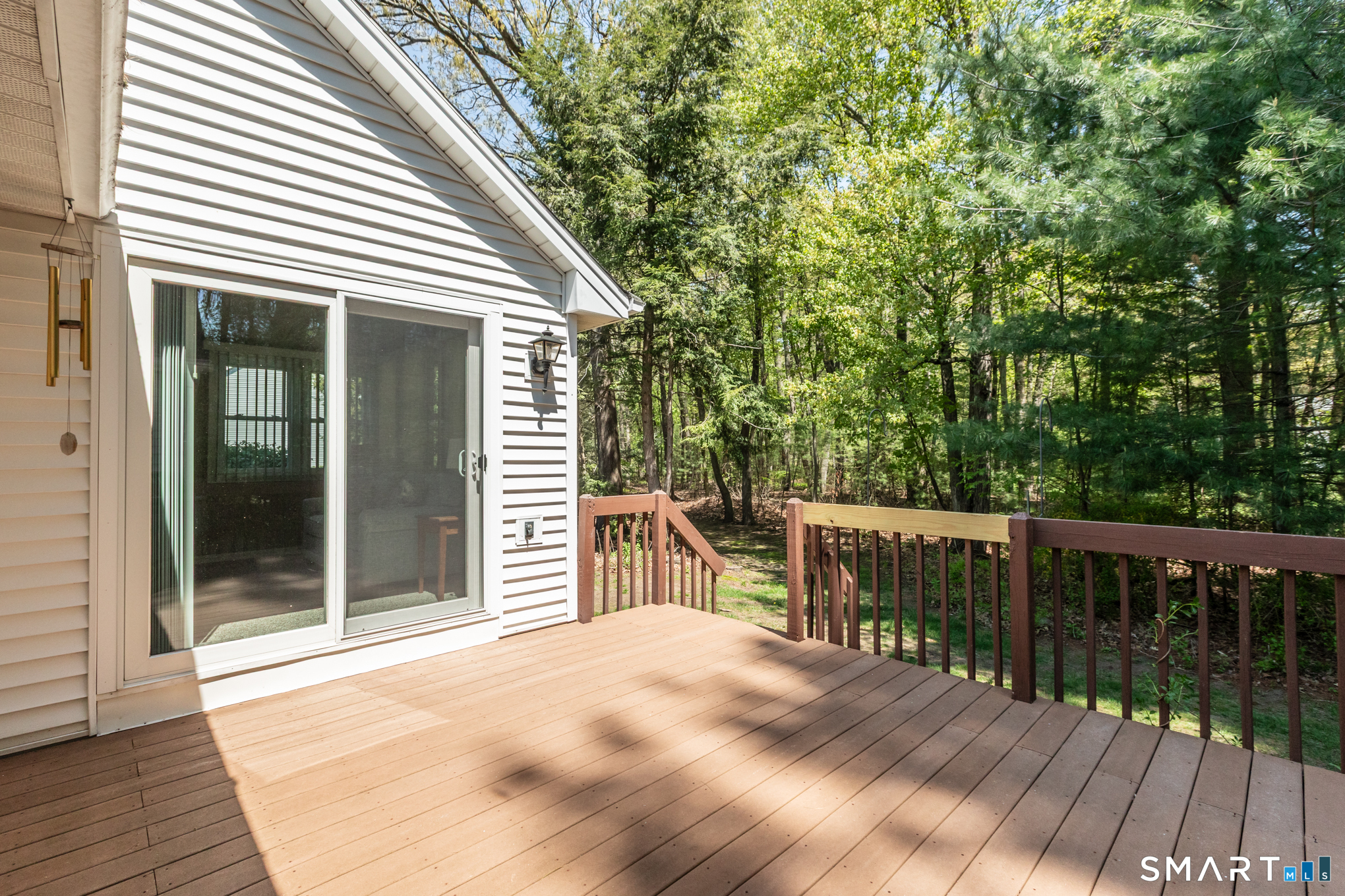 81 Oldefield Farms Road, Unit 81 Enfield, CT 06082 - Photo 31 of 35 a view of a chairs and table in the balcony