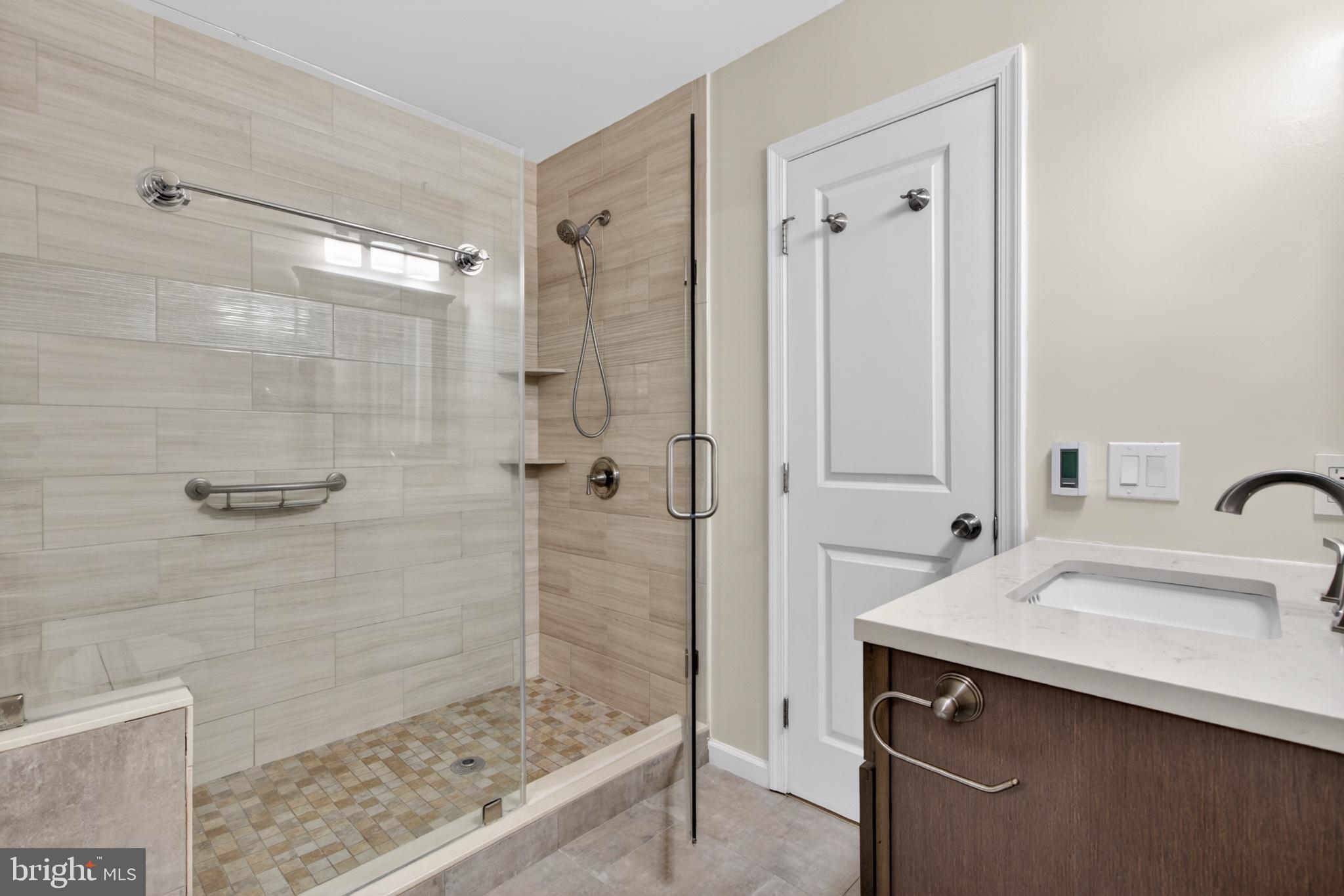 16 Redding Ridge Drive Gaithersburg, MD 20878 - Photo 28 of 53 Sleek modern bathroom retreat.