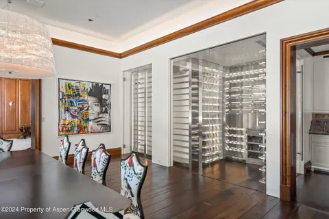 a view of a living room and dining room