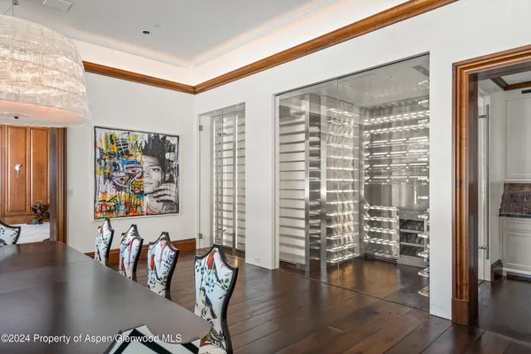 a view of a living room and dining room