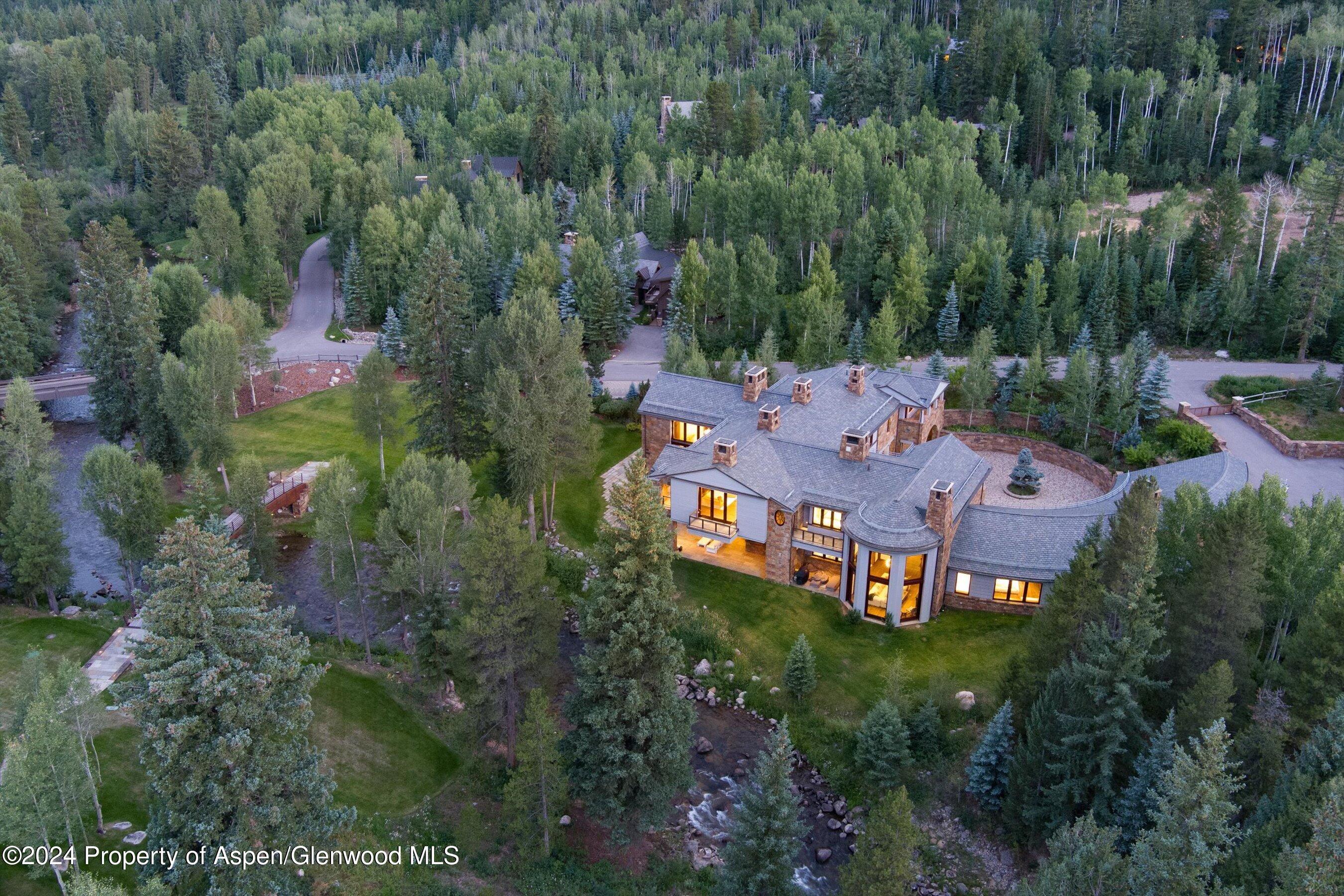 41 Popcorn Lane Aspen, CO 81611 - Photo 49 of 54 an aerial view of a house with a garden