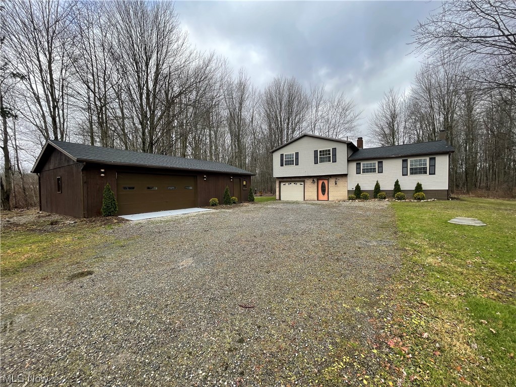6135 California Road Williamsfield, OH 44093 - Photo 4 of 37 View of front of property with a garage