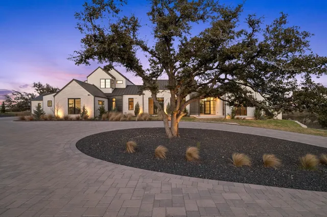 a front view of a house with yard