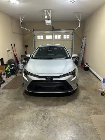 a kitchen that has a stove and a table in it