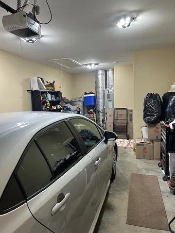 a view of outdoor space with signage and flags