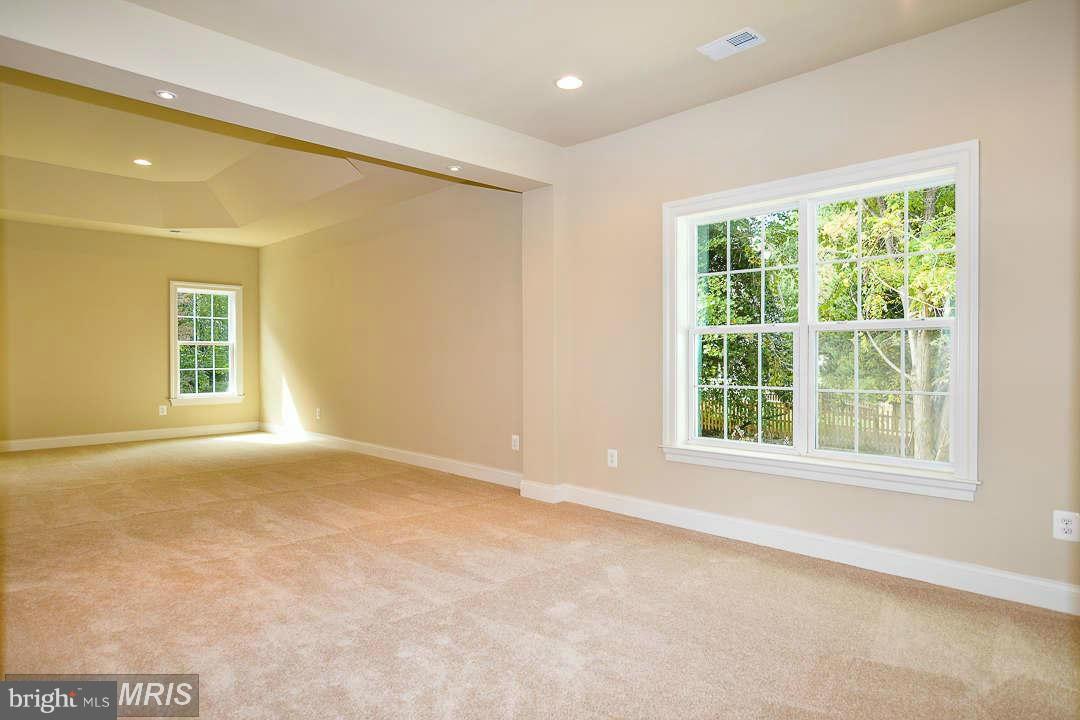 8536 Old Keene Mill Road Springfield, VA 22152 - Photo 20 of 30 an empty room with windows