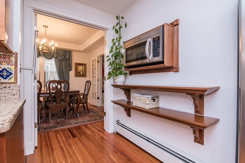 108 Brunswick Street Springfield, MA 01108 - Photo 13 of 42 a dining room with furniture and wooden floor