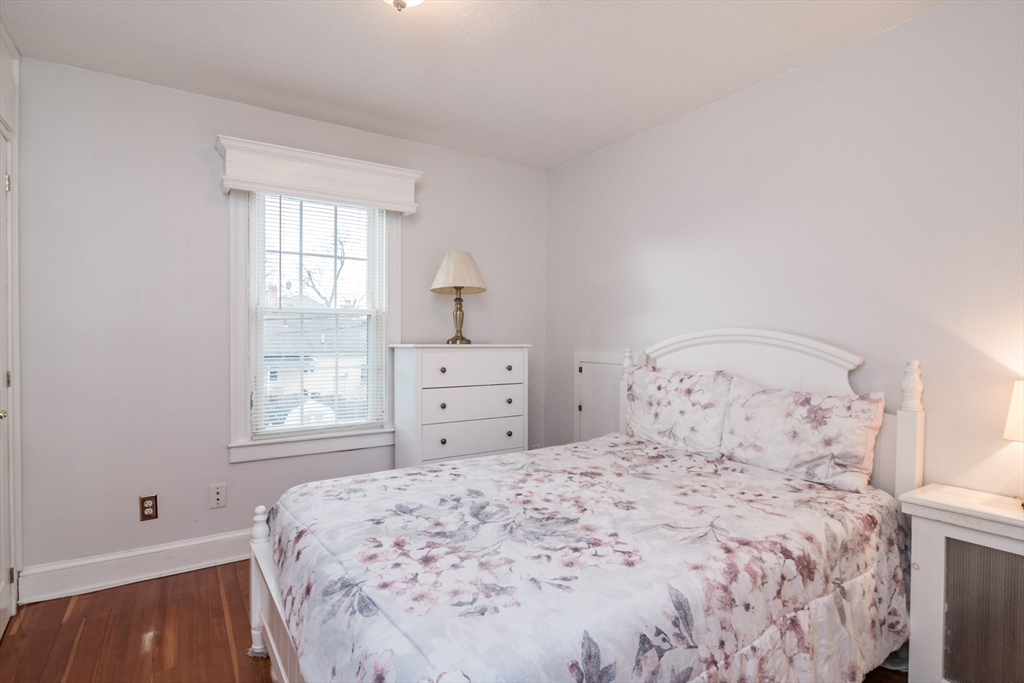 108 Brunswick Street Springfield, MA 01108 - Photo 22 of 42 a bedroom with a bed and a window