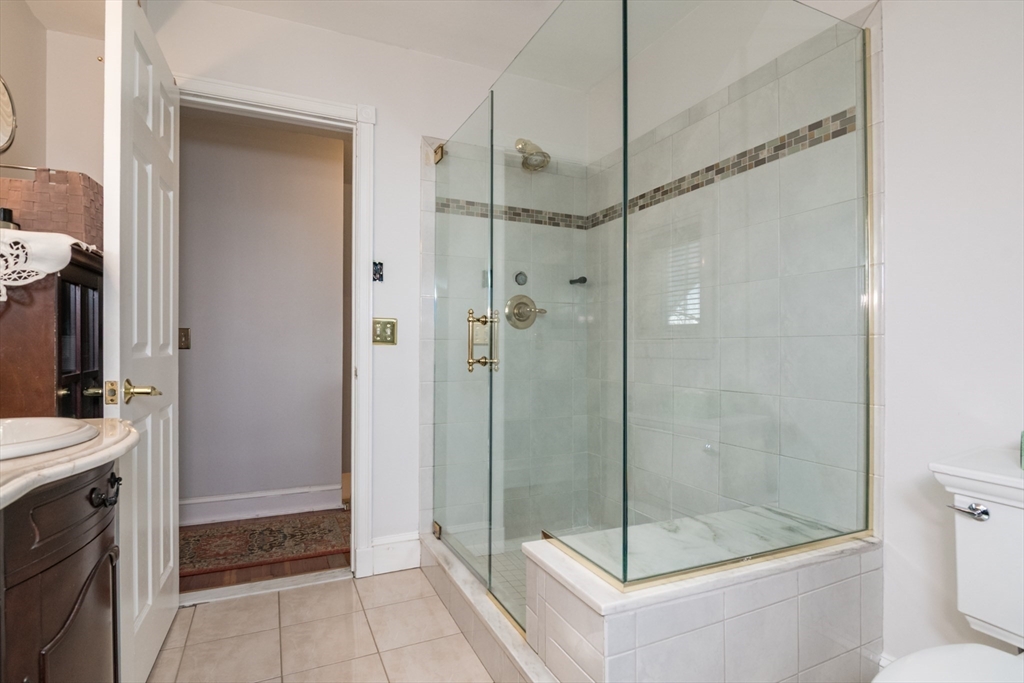 108 Brunswick Street Springfield, MA 01108 - Photo 24 of 42 a bathroom with a shower and a sink