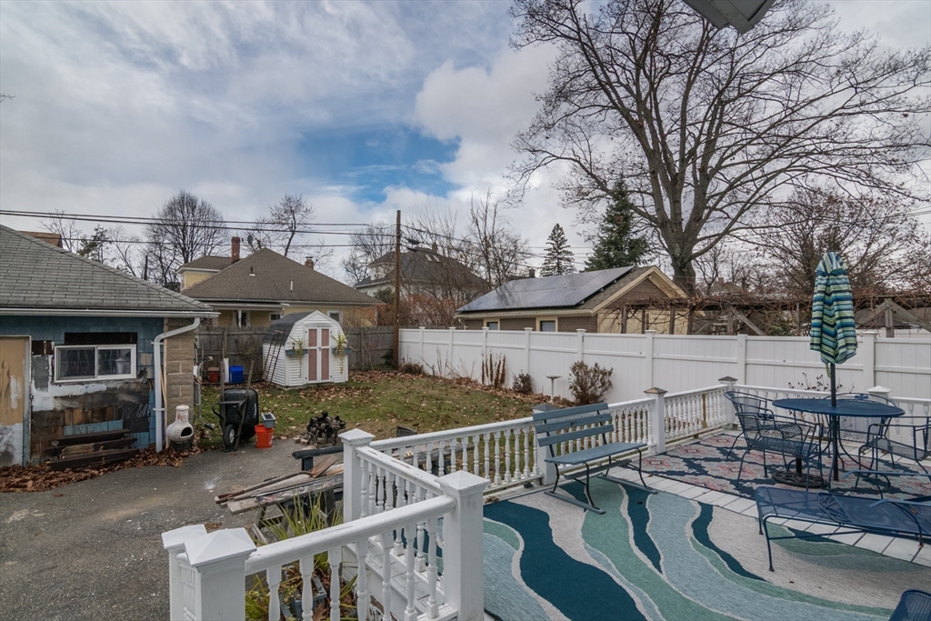 108 Brunswick Street Springfield, MA 01108 - Photo 33 of 42 a view of a house with backyard and roof