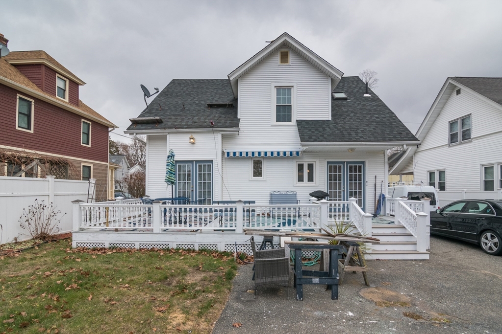 108 Brunswick Street Springfield, MA 01108 - Photo 35 of 42 a front view of a house with a table and chairs