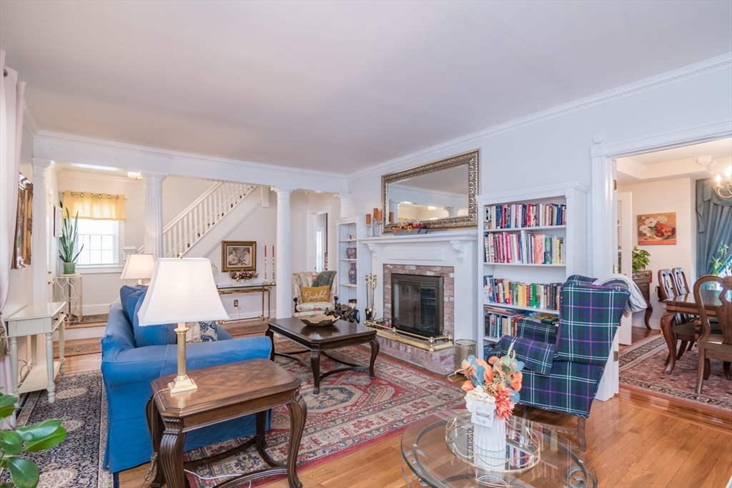 108 Brunswick Street Springfield, MA 01108 - Photo 5 of 42 a living room with furniture and a fireplace