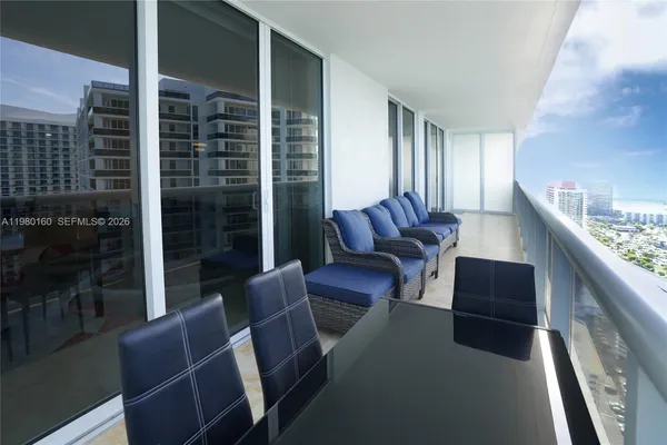 a balcony with furniture