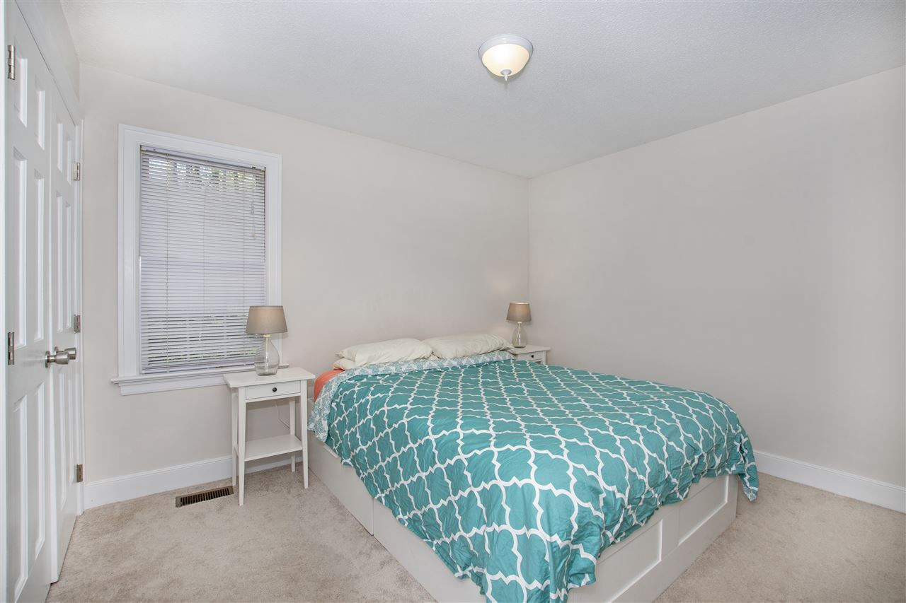 6909 Sandringham Drive Raleigh, NC 27613 - Photo 13 of 24 Back bedroom